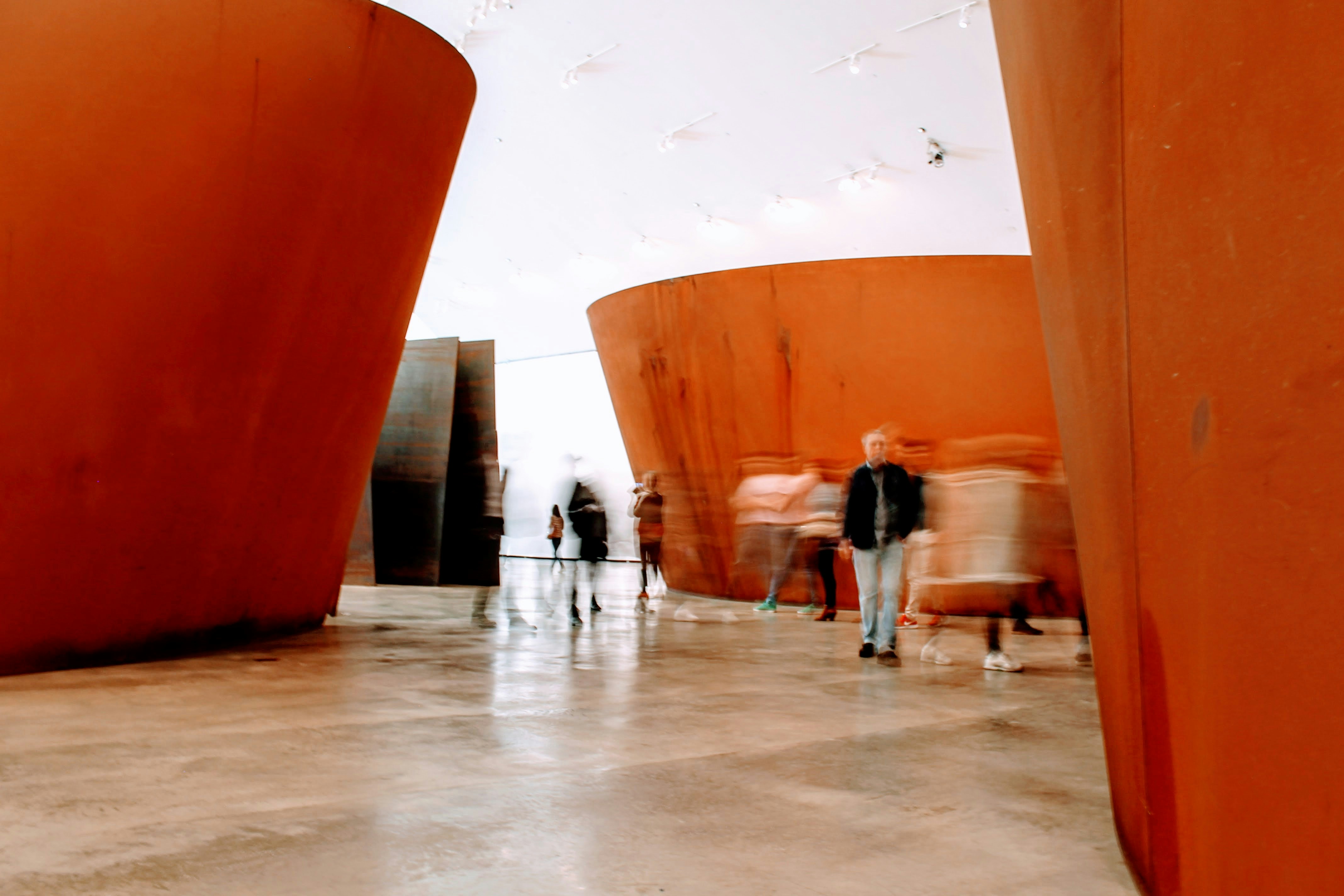Contemporary art installation with terracotta sculptural forms